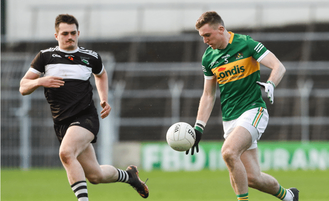 Seamus Kennedy, Clonmel Commercials goes on the attack in Sunday's AIB Munster Club Senior Football Championship semi-final, watched by Newcastle West's Sean Murphy. Picture: Michael P Ryan/Sportsfile