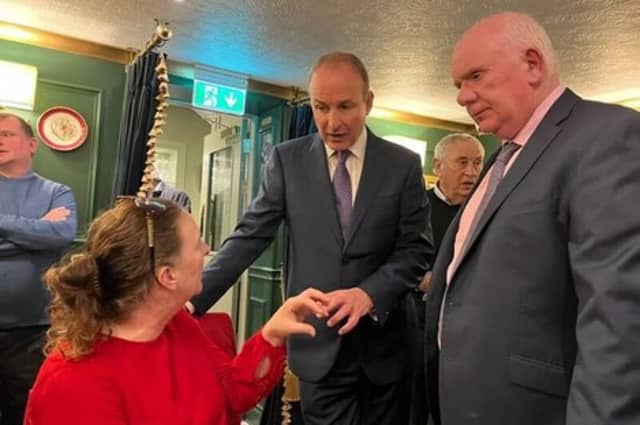 Dee Ryan (We Just Want To Swim); An Taoiseach, Micheál Martin; and Deputy Jackie Cahill discussing the reopening of the Templemore Garda College swimming pool in Thurles last Friday.