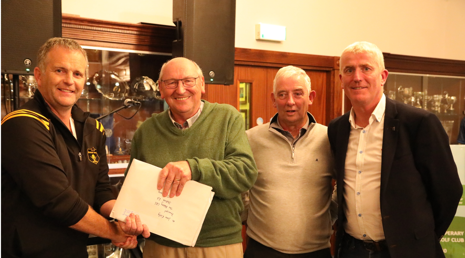 At the Abbey School Golf Classic, Paddy Delaney, Arravale Rovers GAA Club, presents the first prize to Jerry Morrissey, with Sean Jackson and John Kiely, Principal, the Abbey School