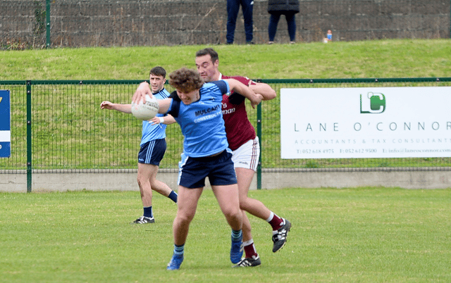 Moyle Rovers' Danny Owens comes under pressure from Ardfinnan's Sean Nagle. Picture: Michael Boland
