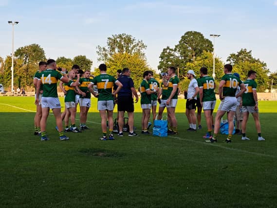 The Clonmel Commercials players pictured taking on water in the break during the game this evening in Golden
