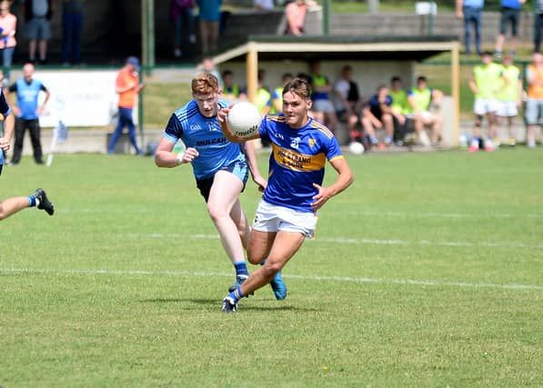 Sean Martin of Kilsheelan Kilcash prepares to launch an attack, with Moyle Rovers' Stephen Quirke giving chase. Picture: Michael Boland