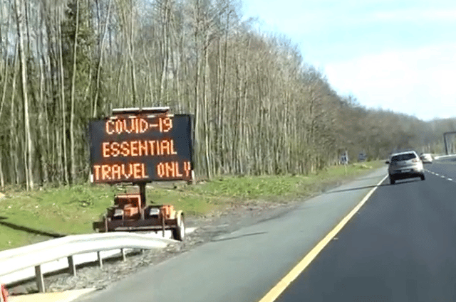 A Covid-19 sign on a deserted M7