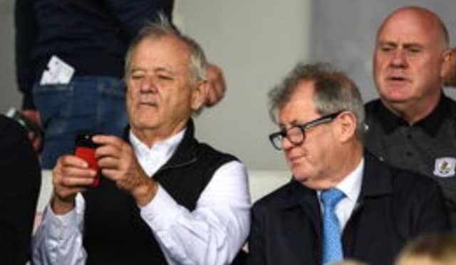 Bill Murray and JP McManus in the stands at Semple Stadium