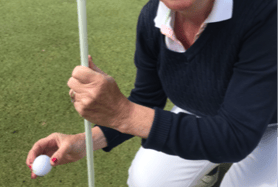 Jenny Lawrence was all smiles picking out the golf ball out of the hole after her hole-in-one on the sixth hole in Dundrum recently