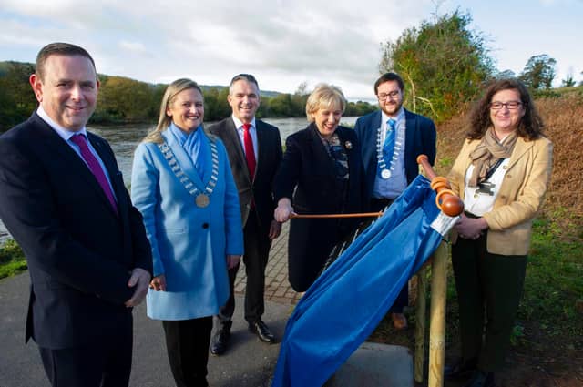 Minister for Rural & Community Development unveiling a plaque at the Suir Blueway in Carrick-on-Suir last November. Further widening of the walk/cycle way near Carrick is planned this summer
