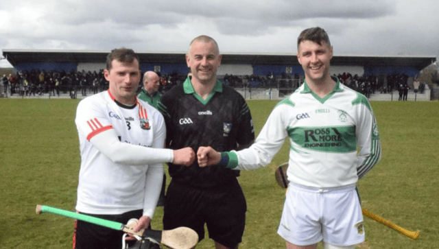 Team captains, Clonoulty Rossmore's Martin Sadlier (right) and Cappataggle's Michael Broderick, with referee Eamonn Stapleton before the start of Saturday's final