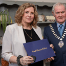 Clonmel Rotary president Michael O’Malley presents Paul Harris Fellowship Medals to Joy O’Carroll (right) and Angela O’Toole, who accepted the award on behalf of her late mother Verona Malone