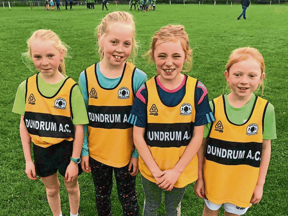 FOUR TO COUNT FROM NOW ON! Dundrum AC U-10 Girls at the recent County Cross Country Relays in Thurles. From left: Belle Kelly, Kate Dooley, Clodagh Ryan and Ellisse Kelly.