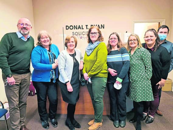 Solicitor Donal Ryan, far left, with some of his current team in Cashel