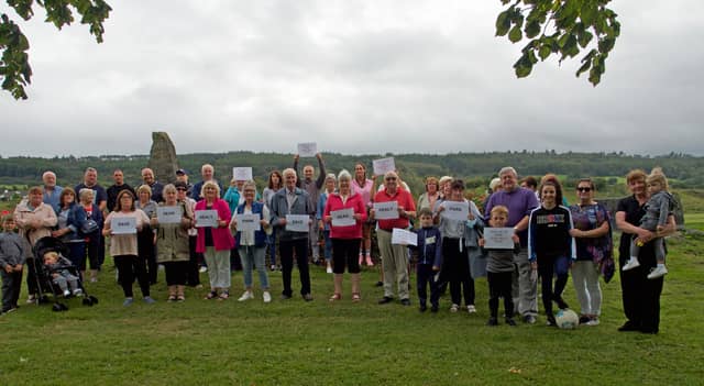 Treacy Park residents pictured at Sean Healy Park in Carrick-on-Suir highlighting their opposition to the development of a car park at the park for Blueway visitors. Picture Anne Marie Magorrian