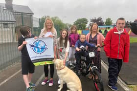 Charlie, Angela, Libby and Poppy Corcoran with deputy principal Ciara Gleeson and pupils, Luke Madden Butler and Simon Ryan