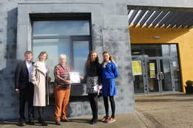 Kate Bourke receiving the Dr Aisling Butler Memorial Bursary from Ursuline Principal Ms Mary Butler in the company of her parents Liz and Tim and her sister Hilary