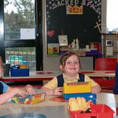 Happy days at Newtown Upper National School. Lucy Graham (left), a first class pupil, was delighted to have some fun with her sister Ella on her first day at school. On right is their mother Claire.