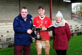 Mid chairman Jonathan Cullen pictured presenting the Mid U21B Hurling Championship trophy to Gortnahoe-Glengoole captain Jack Moore alongside Mid secretary Sally Young. Picture: Eamonn McGee