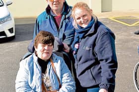 Service user Kathleen Byrnes with staff member Julieann Smyth and service user Michael Moore