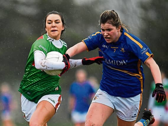Mayo's Niamh Kelly holds off the challenge of Tipperary's Cora Maher in the league clash. Photo by Sam Barnes/Sportsfile