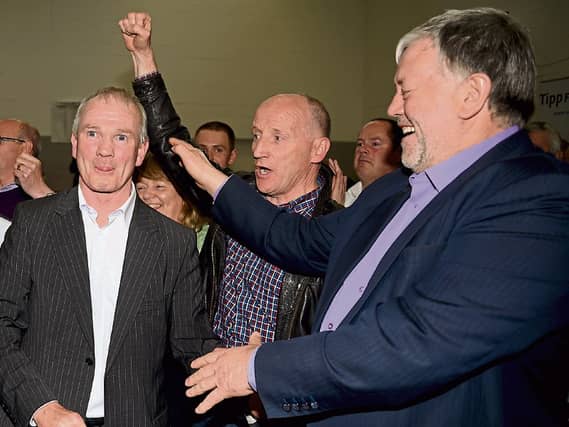 Cllr Joe Bourke is congratulated by Noel Coonan on his election to Tipperary County Council in 2014