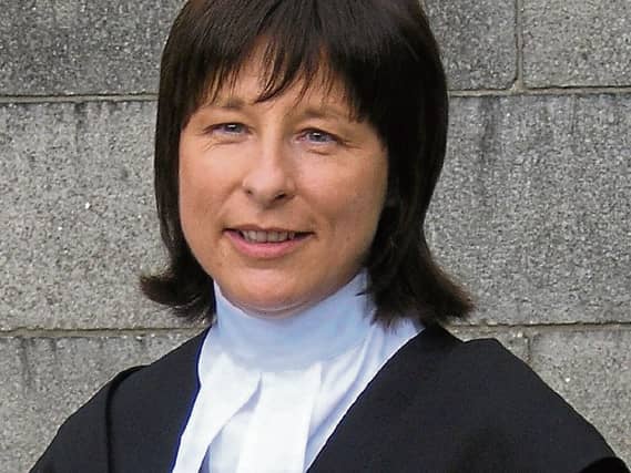 Judge Elizabeth MacGrath