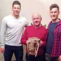 Our columnist JJ Kennedy with Dan and Tom Morrissey - and the Liam McCarthy Cup