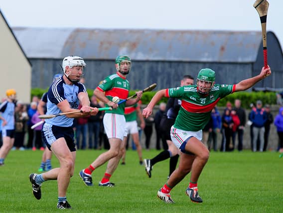 Nenagh's Dáire Quinn pictured in action against Loughmore's Anthony Ryan. Photo: Eamonn McGee