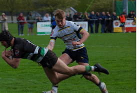 Freddie Davies dives over the line for one of his three tries. Picture: Paul Morris
