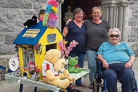 The overall winner of the Borrisoleigh Festival wheelbarrow competition, Kathleen Ryan, with her sister Margaret and mother Effie