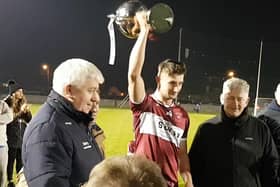 Conor Kenny pictured lifting the Johnny Ryan Cup on Friday night.