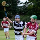 Eric O'Halloran (left), seen here in action against Ballingarry's Ger Fennelly, scored two points when Carrick Swans beat Killenaule in the Clonmel Oil South Tipp Senior Hurling Championship Final.