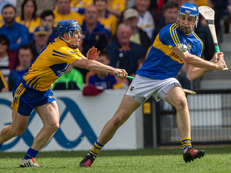 John McGrath pictured in action against Clare's Podge Collins.