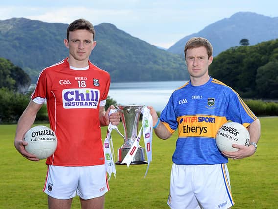Cork's Marc Collins and Tipperary captain Brian Fox pictured at the launch of the Munster Senior Football championships in Muckross House, Killarney recently.