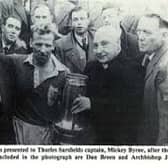 The late Mickey Rattler Byrne pictured accepting the Dan Breen Cup from Dan Breen himself