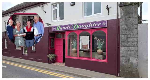 John Lanigan and Tommy Barrett of Thurles Tidy Towns presenting Gary and Geraldine Roche with the Best Presented Shopfront in Thurles, won numerous times by Ryan's Daughter over the years