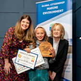 Willow McBride , Cloughjordan No. 1 National School, Co. Tipperary pictured at the Green-Schools Marine Environment Awards in Dublin with Joanne Scott, Green-Schools Manager and Catherine Gaul, Department of Climate, Energy and the Environment