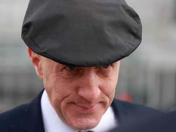 Former minister of state Michael Healy-Rae looks at the camera