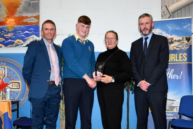 Toby Corbett receiving his award