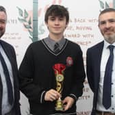 Pictured at the ERSS Transition Year graduation ceremony are special guest and past pupil, Dermot Keyes, TY Student of the Year Seán Flynn and teacher Peter Foran