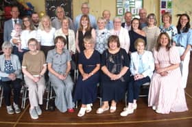 Relatives and past and present staff members with retiring Presentation Primary School staff Barbara Bennett, Patricia Tobin, Emma Power and Catherine Arnold (seated front row second from left to third from right). School Principal Pat Robinson is standing back row far left, and Deputy Principal Anne Millea is seated front far right. 