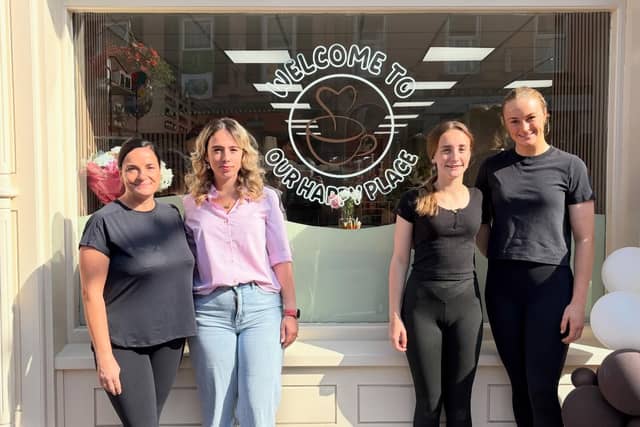 Cozy Bean owner Paulina Zieba is pictured with members of her team following the opening of the new coffee shop.
