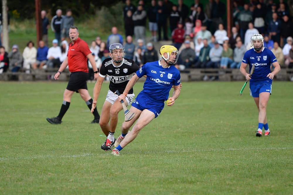 Michael Cahill, Thurles Sarsfields, is in control of this situation against Carrick Swan's Taylor Fleming 