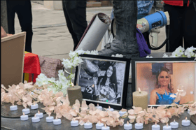 Photographs of Jady Cristine Pereira Rosa and Annmarie O’Reilly on display during Monday’s vigil  