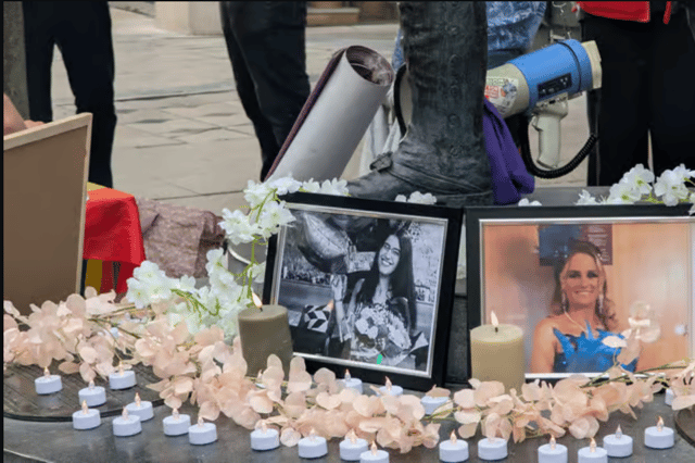 Photographs of Jady Cristine Pereira Rosa and Annmarie O’Reilly on display during Monday’s vigil