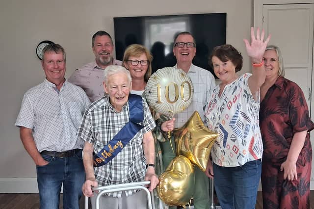 Bob Savage with his family at his 100th birthday celebration. From left, his son Andrew, Doug Drummond, Tanya Barry, his son Christopher, Ute Doerge-Baischew and Melanie Griffith
