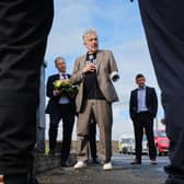 Giles Duley laying a wreath at the Tipperary Remembrance Arch at St Vincent’s Hospital  