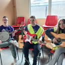 Daniel Hayes, Tito Hehir and Maya Lizak providing some entertainment on the day