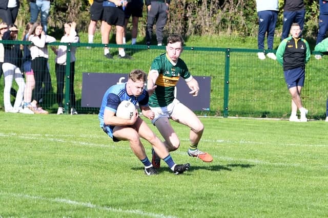 Brian McKeown, Moyle Rovers (left) and Cian Smith, Clonmel Commercials, in action during the County Senior Football Championship semi-final