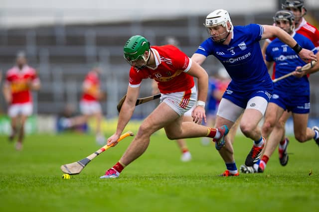 David Costigan, Moycarkey-Borris, gets to the ball ahead of Thurles Sarsfields' Denis Maher