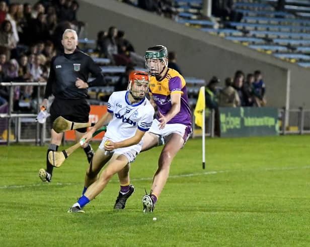 Kayden Cloona, St Mary's, has possession while Newport's Charlie Tobin prepares to challenge during the County Minor A Hurling Championship final in Thurles  