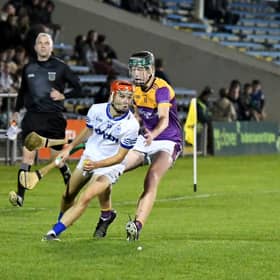 Kayden Cloona, St Mary's, has possession while Newport's Charlie Tobin prepares to challenge during the County Minor A Hurling Championship final in Thurles  
