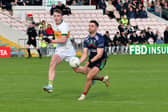 Tadhg Sheehan, Clonmel Commercials (left) in action against Loughmore/Castleiney's Ed Connolly during Sunday's FBD Insurance County Senior Football Championship final